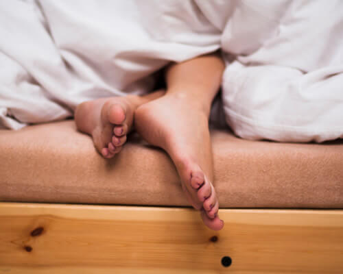 Image of person with restless legs.